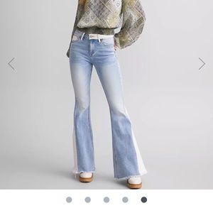 Size 31 Flying Monkey flare leg jeans NWOT. Too big for me.